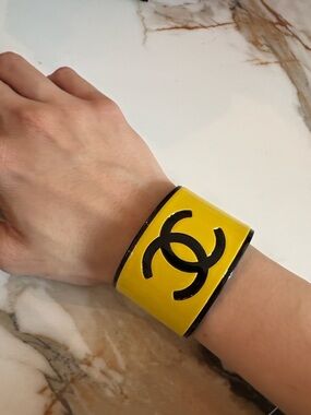 CHANEL Yellow and Black Enamel CC Logo Cuff